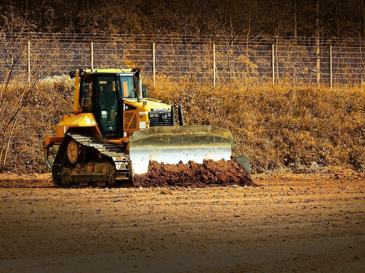 Bulldozer pushing earth on a construction site